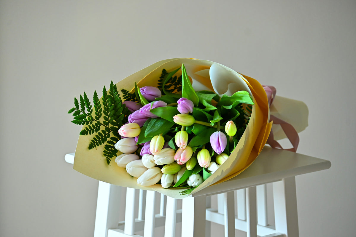 Handcrafted daily tulip bouquets with the best market-fresh colors. Send fresh seasonal tulip bouquets across Brisbane.